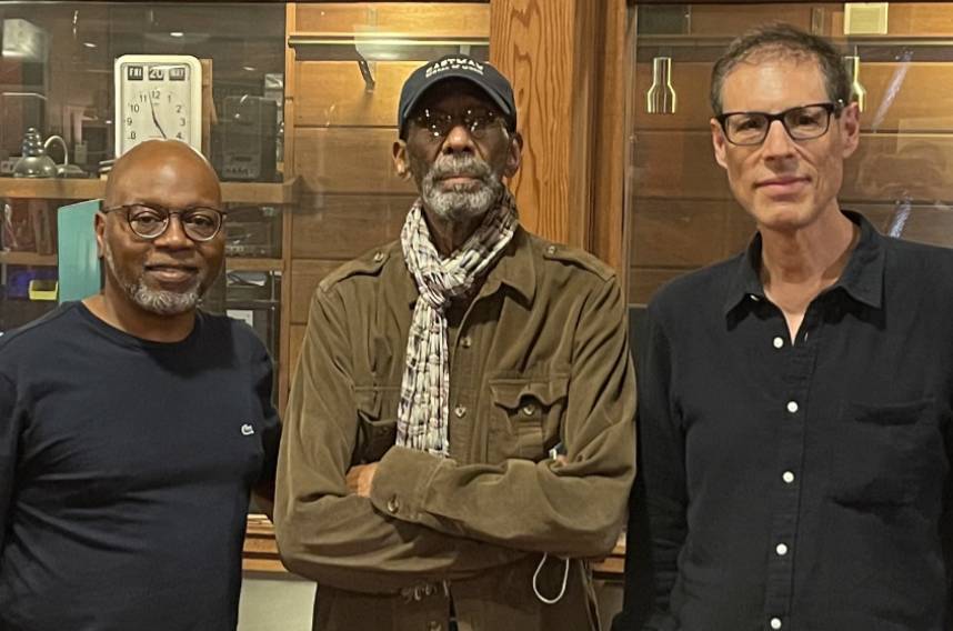 Lewis Nash, Ron Carter and Ray Gallon standing in a line looking at the camera